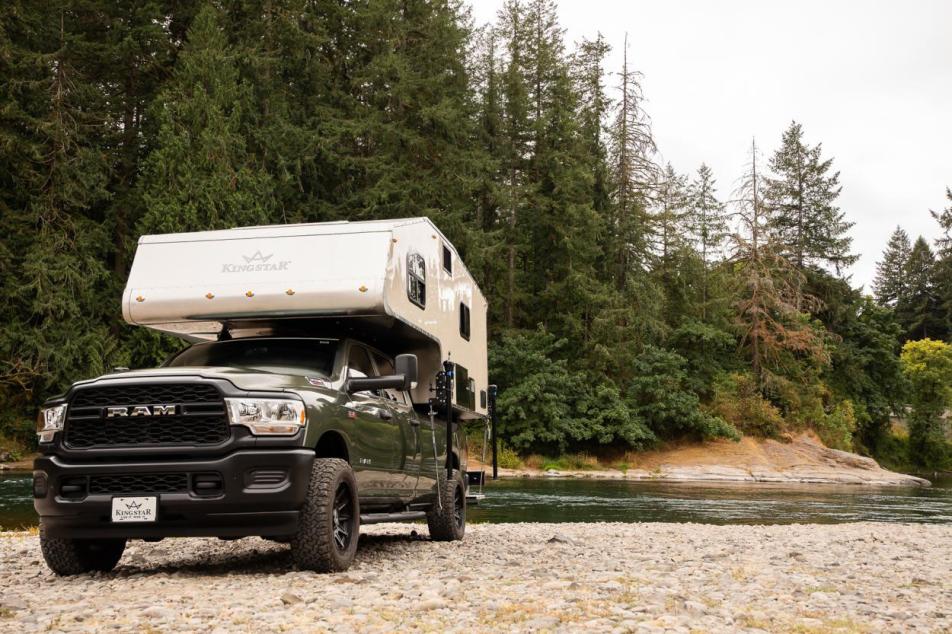 kingstar truck bed camper backed into a campsite 