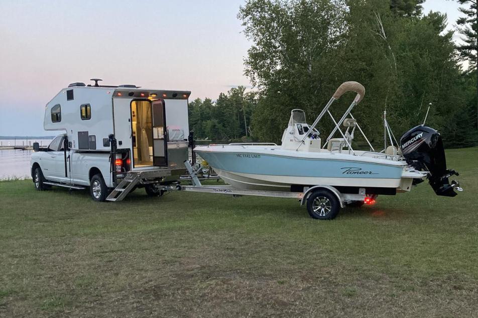 kingstar truck bed camper pulling a boat 