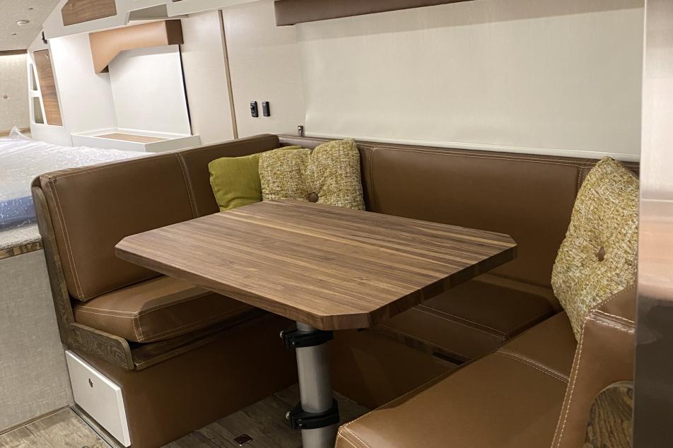 U shape dinette that converts to 7’x43” sleeper bunk